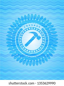 hammer icon inside water wave emblem background.