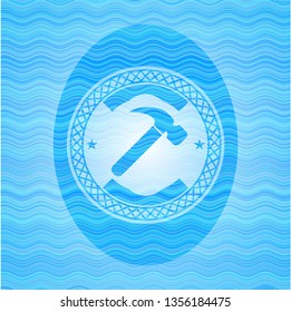 hammer icon inside water wave concept emblem background.