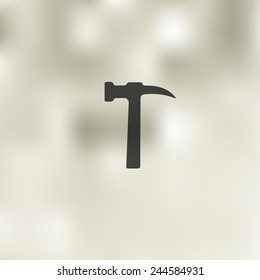 hammer icon on blurred background