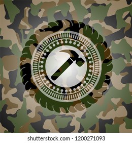 hammer icon on camo texture