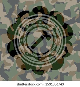 hammer icon on camo texture