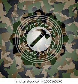 hammer icon on camo texture