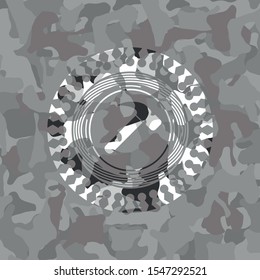 hammer icon on grey camo texture