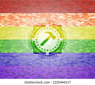 hammer icon on mosaic background with the colors of the LGBT flag