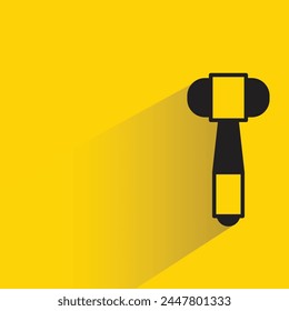 hammer icon with shadow on yellow background