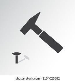 Hammer a nail. Black flat design. Vector illustration