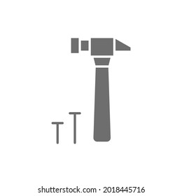 Hammer and nails, building tools grey icon.