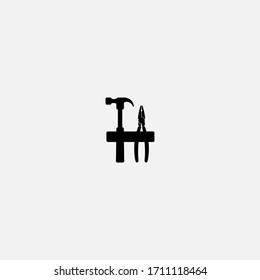 hammer and pliers icon.hammer and pliers vector on gray background