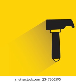 hammer with shadow on yellow background