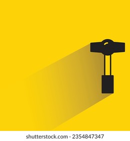 hammer with shadow on yellow background
