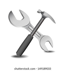 hammer and spanner on a white 