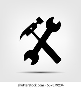 Hammer and wrench icon vector