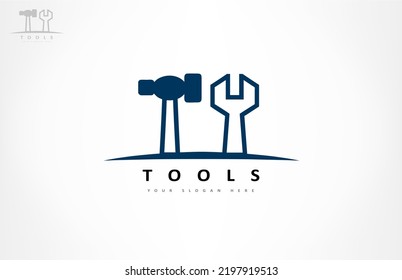 Hammer and wrench logo vector. Working tool design.
