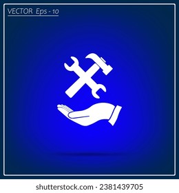hammer and wrench on the hand, vector icon