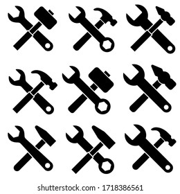 Hammer and wrench. Repair icon, logo isolated on white background