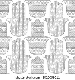 Hamsa hand. Black and white seamless pattern for coloring page. Decorative amulet for good luck and prosperity.