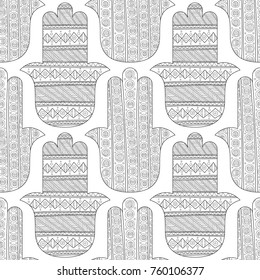 Hamsa hand. Black and white seamless pattern for coloring page. Decorative amulet for good luck and prosperity.