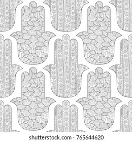Hamsa hand. Black and white seamless pattern for coloring page. Decorative amulet for good luck and prosperity.