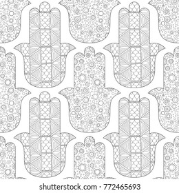 Hamsa hand. Black and white seamless pattern for coloring page. Decorative amulet for good luck and prosperity.