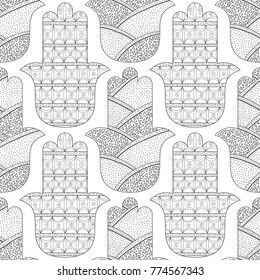 Hamsa hand. Black and white seamless pattern for coloring page. Decorative amulet for good luck and prosperity.