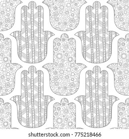 Hamsa hand. Black and white seamless pattern for coloring page. Decorative amulet for good luck and prosperity.