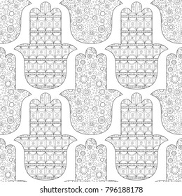 Hamsa hand. Black and white seamless pattern for coloring page. Decorative amulet for good luck and prosperity.