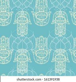 Hamsa hand and lotus flowers seamless pattern. Vector texture.