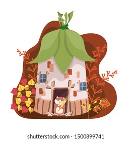Hamster with spikelet stands on the threshold of the house with a roof of leaves on the background of autumn fairy plants. Flat style. Vector