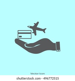 hand and airplane ticket. 