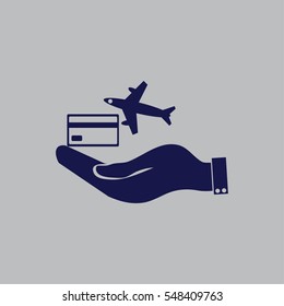 hand and airplane ticket. 