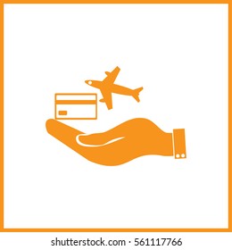 hand and airplane ticket. 