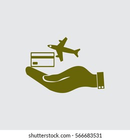 hand and airplane ticket. 