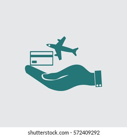 hand and airplane ticket. 