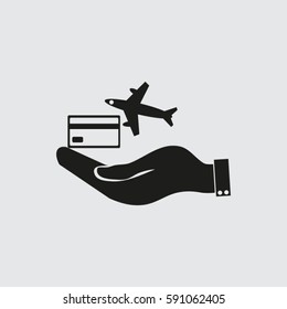 hand and airplane ticket. 