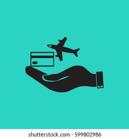 hand and airplane ticket. 
