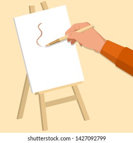 The hand of the artist draws a brush on an easel. Work with art tools.3D. Isometry. A vector illustration in flat style.