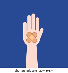 Hand with bandage and blue background  