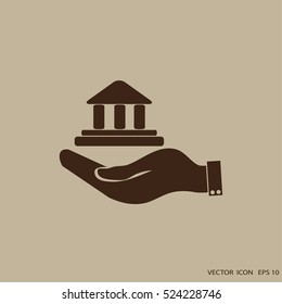 Hand and bank building. Vector icon.