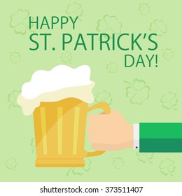 Hand with beer on green St. Patrick's day background with clovers, illustration.