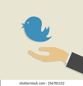 hand with bird flat icon design