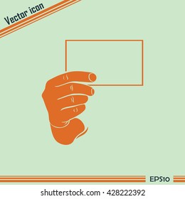 Hand with a blank sheet of paper