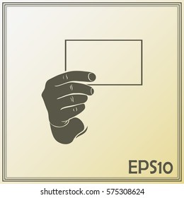 Hand with a blank sheet of paper