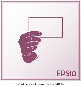 Hand with a blank sheet of paper