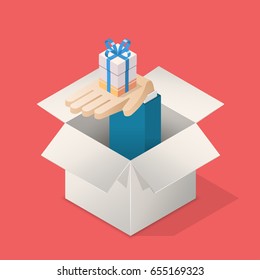 Hand from box holding gift. Surprise present concept. Isometric vector illustration