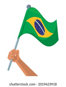hand with brazil flag waving