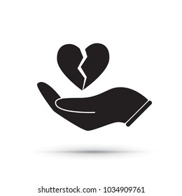 Hand with broken heart icon isolated on white background. Silhouette of a hand with heart in it. Vector illustration for your graphic design.