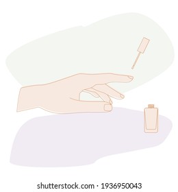 Hand brush with nail polish and nail brush with a background of colored abstract spots. Manicure