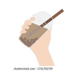Hand is holding​ a bubble tea. A cold soft drink for summer. Sweet beverage. Tasty and yummy food. A takeaway Product logo or advertisement.