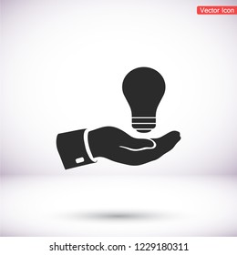 hand and bulb. icon. Vector Eps 10