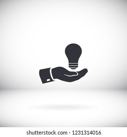 hand and bulb. icon. Vector Eps 10